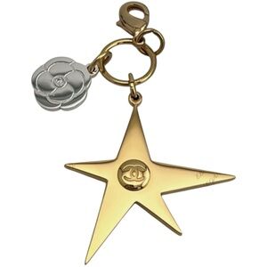 CHANEL 2025 Holiday Comet Star and Camellia Bag Charm with Chanel Black Pouch